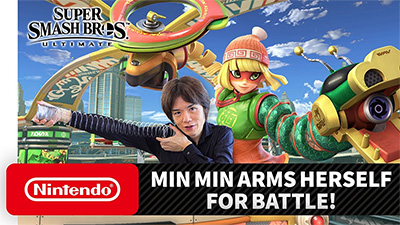 Masahiro Sakurai with a spring announcing Min Min for Smash.